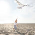 young adult having fun with kite